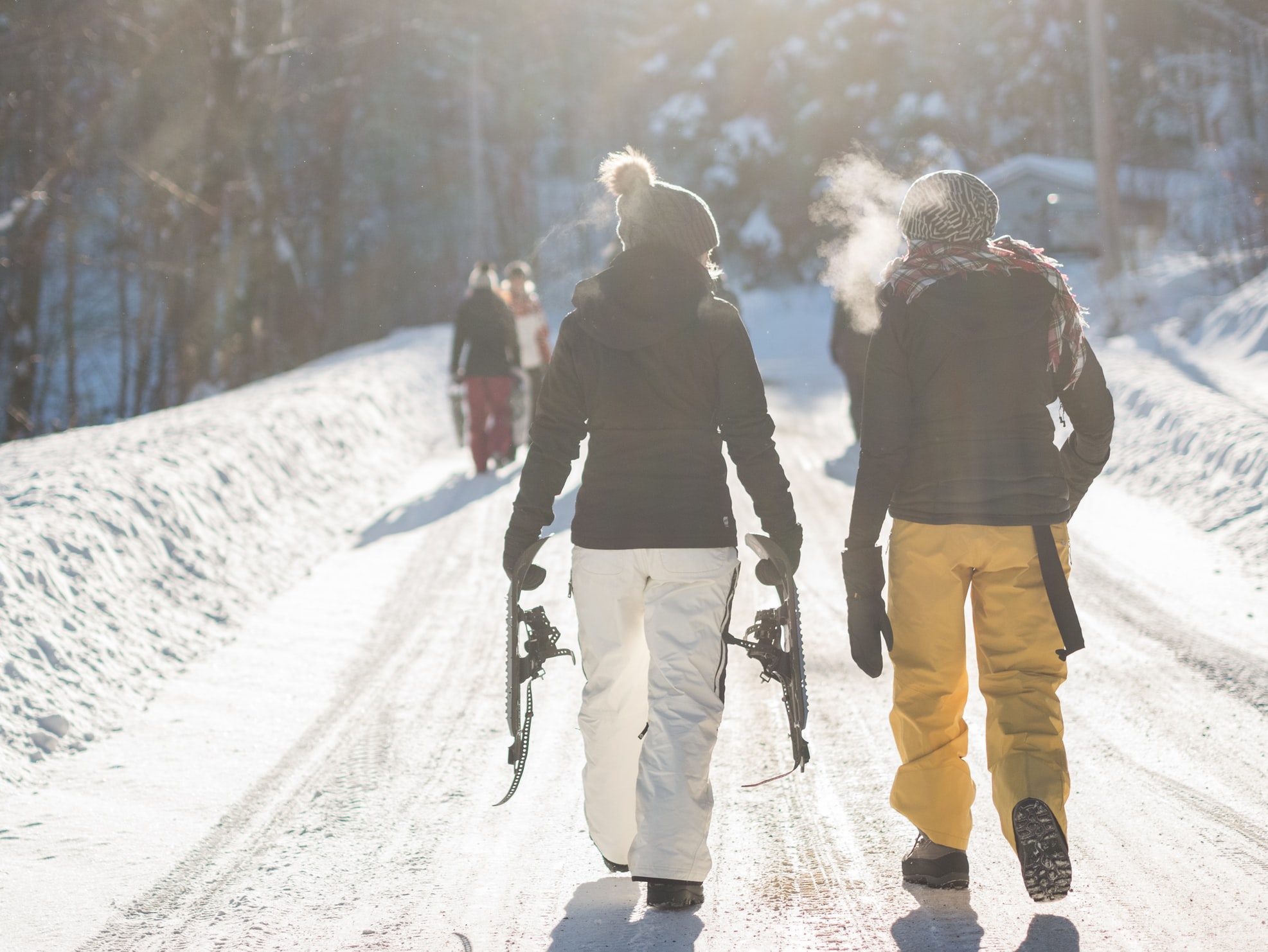 people walking on a ski slope